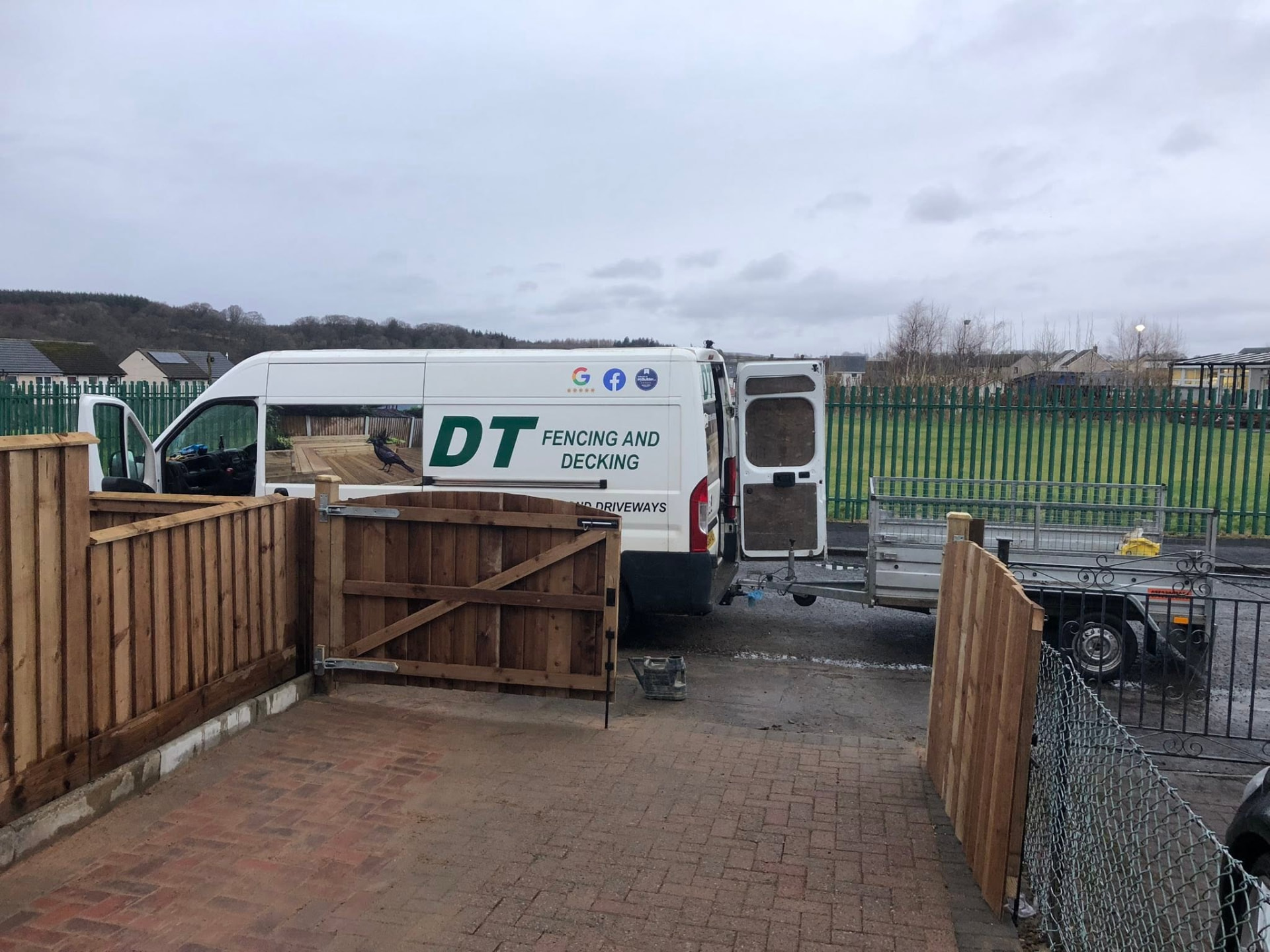 DT Fencing & Decking van on site next to newly fitted timber gates